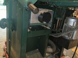 a machine that is sitting on a cart in a garage