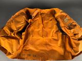 an old jacket that has been worn by a man