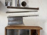 a shelf that has a bunch of tools on it