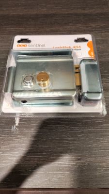 a box with a phone inside of it on a table