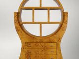 an image of a wooden cabinet with a mirror on top of it
