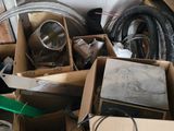 a pile of assorted items in a garage