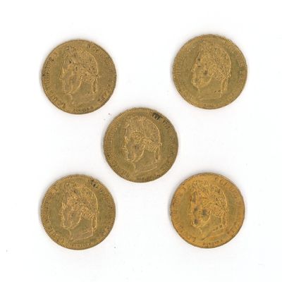 quatre pièces d'or à l'effigie d'un homme et d'une femme