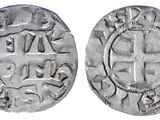 une pièce d'argent avec une croix au recto et une croix au verso