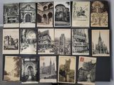 a lot of old postcards that are on the wall