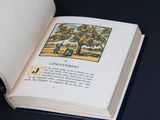 an open book with a picture of an elephant on it