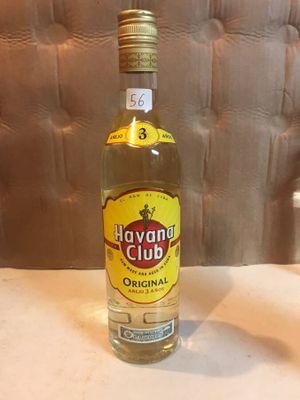 a bottle of liquor that is sitting on a table