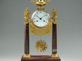 a clock that is sitting on top of a table