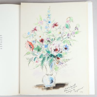 a drawing of a vase of flowers in a book