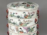 a white box with asian designs on it on a table