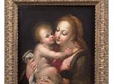 an old painting of a woman holding a baby in her arms