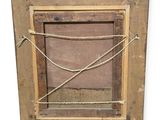 an old picture frame with a rope hanging from it ' s sides