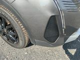 a close up view of a car ' s front bumper
