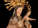 an image of a statue of a woman holding a child