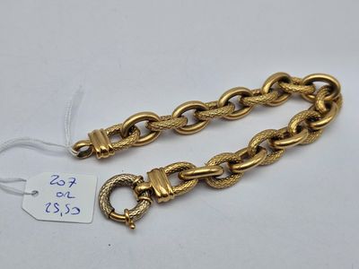 a pair of gold chain bracelets with clasps