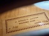 a label on the bottom of a bag that says j kochly luther bourges cher