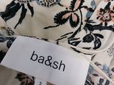 an image of a label on a dress with a floral pattern