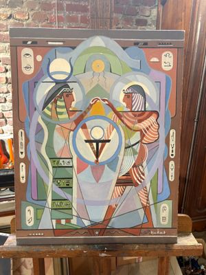 a picture of a painting on a easel in a room