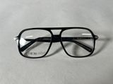 the glasses are black and have a clear lens on them