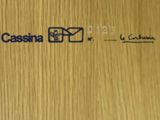 a close up of a sign on a wooden door