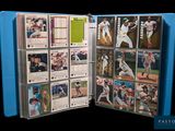 an image of a baseball card album with baseball cards