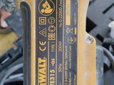someone is using a cordless drill to cut a piece of wood