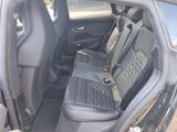 the back seats of a car with a seat belt in a car