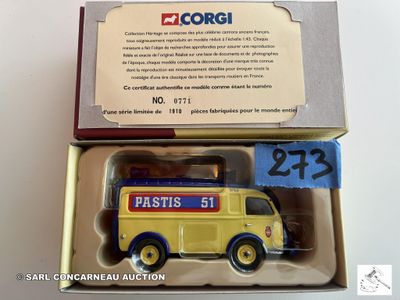 un camion miniature dans une boîte avec une étiquette de prix