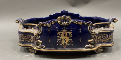 an image of a blue and gold bowl with a lion on it