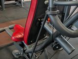 a red and black gym equipment in a gym