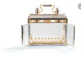 a glass box with a mirror inside of it
