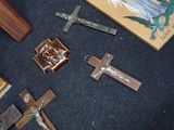 many religious items laying on the floor next to each other