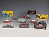 several different model cars are on display in a display case