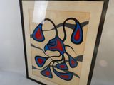 tableau encadré représentant une peinture abstraite bleue et rouge dans un cadre noir