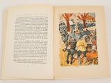 an open book with a picture of a man and a dog on it