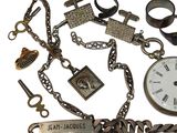 a lot of jewelry that is on display on the table