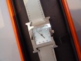 a watch that is sitting in a box on the table