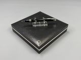 fountain pen in a black box on a white background