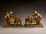 pair of antique bronze figurines of a boy and a girl