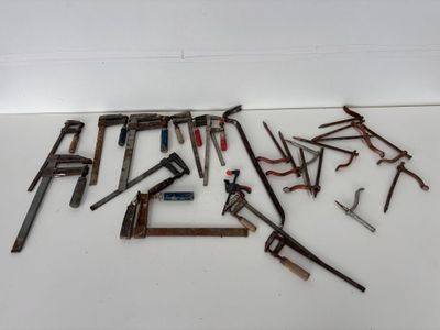 a lot of tools that are laying out on the floor