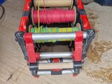 a picture of a reel of thread in a toolbox