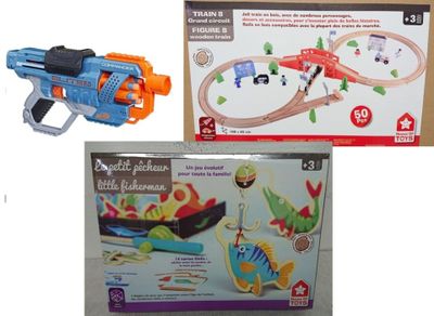 two toy trains and a toy gun on the table