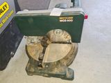a machine that is sitting on the floor in the room