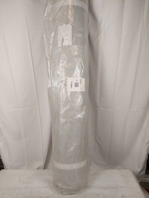 a large clear vase sitting on top of a white table