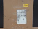 a cardboard box with a picture on it sitting on a table