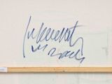 a picture of a piece of art with writing on it