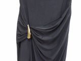 a black dress with a gold buckle on the side
