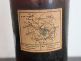 a bottle of wine that has a map on it