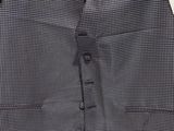 a close up of a vest with a tie on it