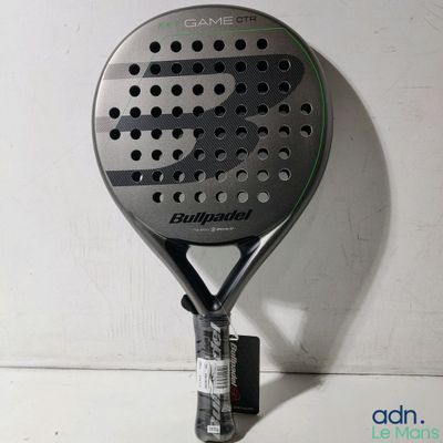 a close up of a tennis racquet on a wall